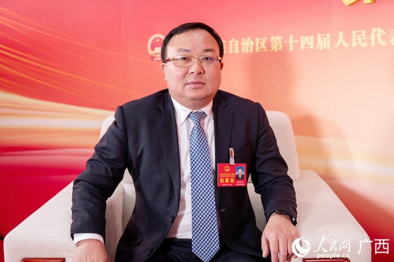 唐標(biāo)文代表接受專訪。人民網(wǎng)記者 嚴(yán)立政攝