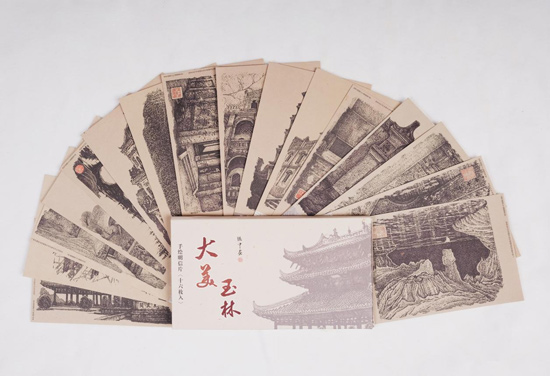 “畫說團隊”宣傳地方文化明信片。張中攝